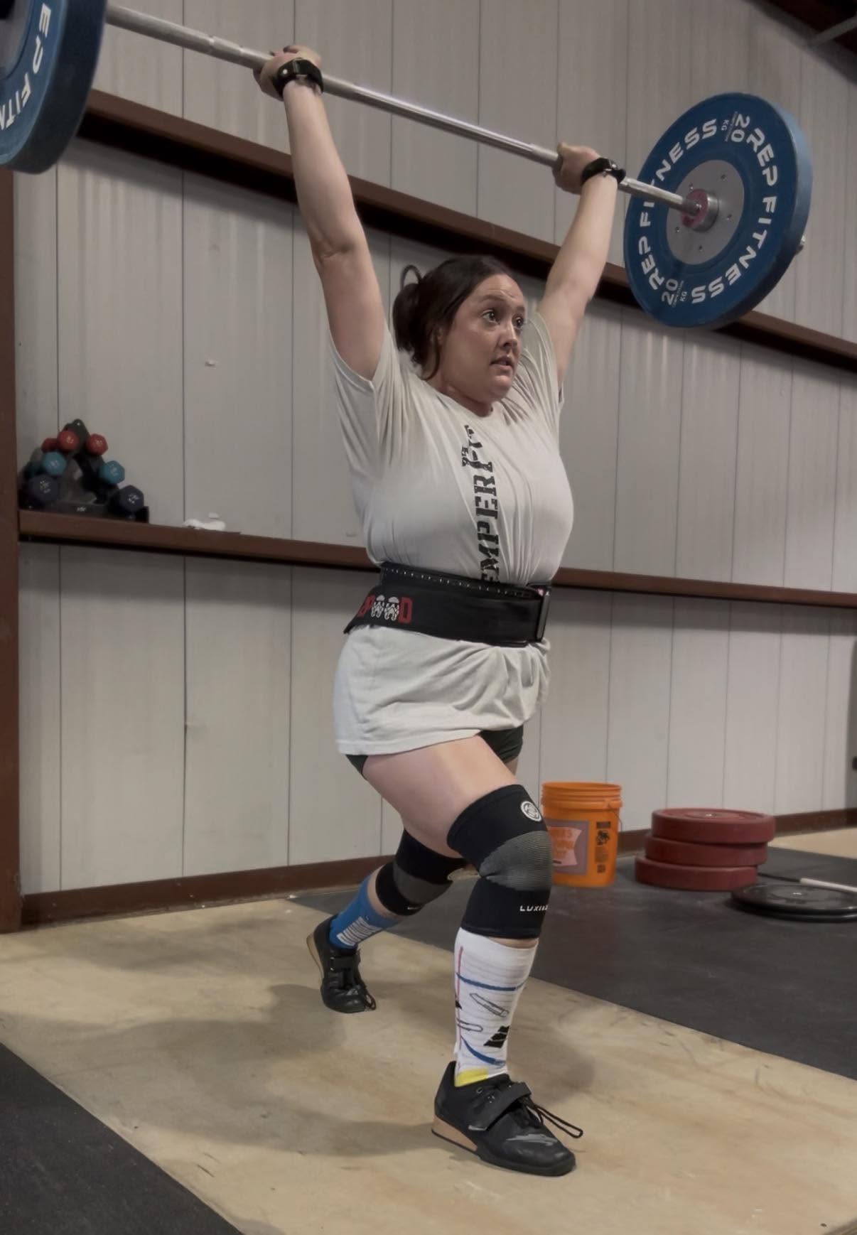 Athlete jerking on the SemperFit gym floor